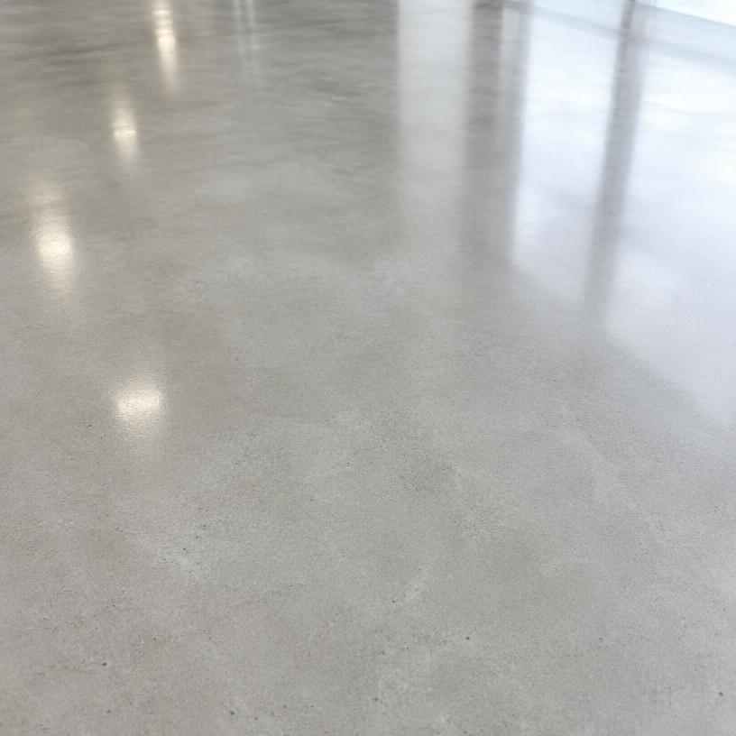 Smooth polished concrete surface